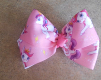 Pretty ponies hairbow grosgrain approx. 4 inch hairbow attached to lined alligator clip with or without crochet headband