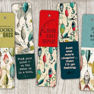 May include: Set of five fishing-themed bookmarks. Each bookmark features a unique design with fishing lures and text like "Hooked on Books & Bass" and "Read, Cast, Repeat." The color palette includes greens, reds, and blues.