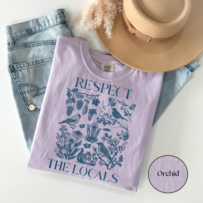 Respect The Locals Comfort Colors shirt featuring vintage wildlife and botanical illustration with birds, flowers, pinecones, and squirrel design, nature lover graphic tee on orchid yellow shirt.