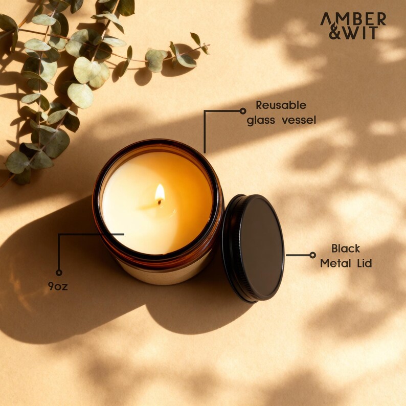 Infographic detailing the 9oz candle's features, including the reusable amber glass vessel and the black metal screw-top lid.