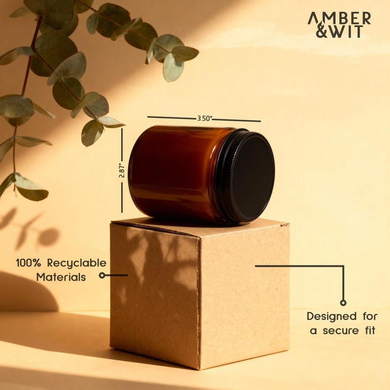The 9oz developer gift candle is shown next to its snug, 100% recyclable kraft shipping box, with dimensions displayed for scale.