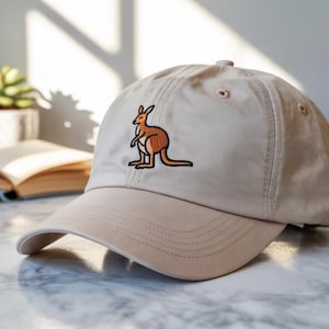 A Relaxed Kangaroo Chilling Under the Sun on a Beige Embroidered Hat