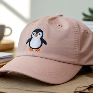 Just a tiny, useless bird with commitment issues and no ability to fly – now embroidered on your Embroidered Hat