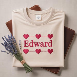 Edward Surrounded by Six Embroidered Hearts on a Creamy Love Embroidered Shirt, Sweatshirt, Hoodie