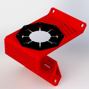 May include: A red, angular mechanical component with a black, circular centerpiece. The centerpiece has a unique, open design with multiple radial arms. The component has several holes for mounting and a ribbed texture.