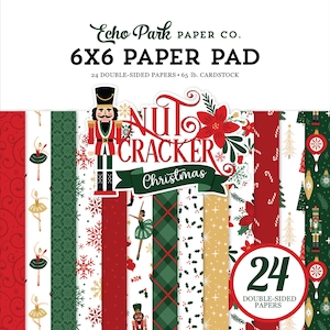 May include: A 6x6 inch paper pad with a Christmas theme. The cover features the text "Nutcracker Christmas" and "Echo Park Paper Co." The pad contains 24 double-sided papers with festive designs, including nutcrackers, snowflakes, and ornaments.