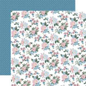 May include: A seamless pattern of pink and blue flowers on a white background. The flowers are arranged in a repeating pattern and are surrounded by green leaves.