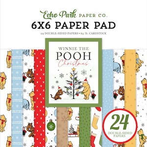 May include: A 6x6 inch paper pad featuring Winnie the Pooh Christmas designs. The pad includes 24 double-sided papers with various patterns, including Winnie the Pooh characters, Christmas trees, and snowflakes. The paper is 65 lb. cardstock.