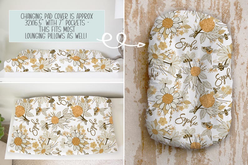 May include: A white changing pad cover featuring a repeating pattern of yellow and grey daisies, bees, and the name Sophie in cursive script. Text states: CHANGING PAD COVER IS APPROX 32X16.5" WITH 7" POCKETS - THIS FITS MOST LOUNGING PILLOWS AS WELL!
