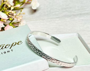 Silver hammered top stainless steel bangle bracelet. Open adjustable cuff bangle.