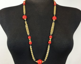 Red bead and textured goldtone chain necklace