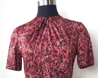 1950's red, black, and white nylon scribble print short-sleeve blouse