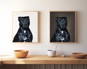 May include: Two framed dog portraits. Each features a black dog with white markings on its chest. The portraits are displayed on a wall above a wooden countertop. A wooden bowl, a white bowl, and small ceramic dishes are on the countertop.