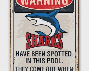 Cartel de jardín / Advertencia: Se han avistado tiburones en esta piscina.