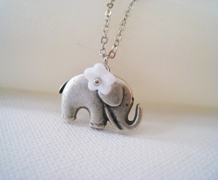 Lovely Elephant Necklace. elephant charm with white flower necklace