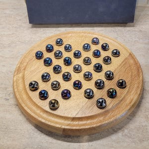 Juego de mesa de solitario de madera