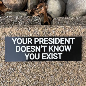 Our Fearless Leader - Bumper Sticker, Made in USA, Black and White, 8.5” x 2.75”