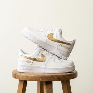 white nike with rose gold swoosh