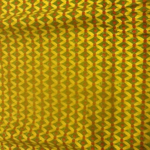 44inch wide gold cotton fabric with small print red green - Christmas
