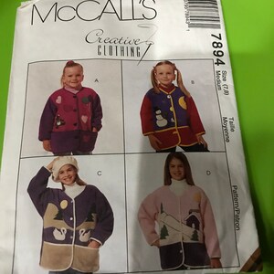 May include: McCall's Creative Clothing pattern 7894 for a child's jacket. The pattern includes four different designs: a pink jacket with hearts, a red jacket with a snowman, a purple jacket with swans, and a pink jacket with a house.