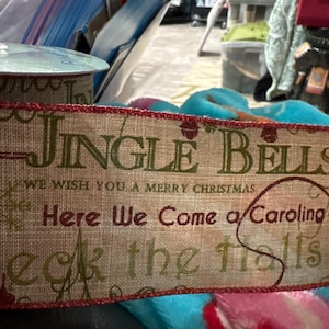 5 yards ribbon trim 2.5 Inches wide /Christmas song titles/ red, green on beige background/wired edge for wreaths and decor