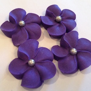 100 royal Icing flowers dark purple and silver center Approx size 3/4”