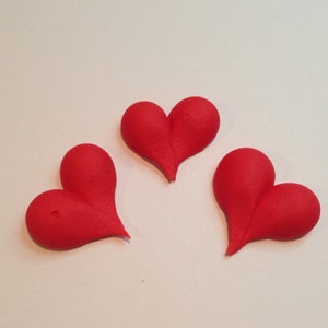 100 red Royal Icing hearts Approx size 1”