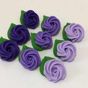 150 royal icing sugar rosettes ( three shades of purple) Approx. Size 1/2”