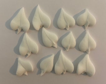 200 white royal icing  leaves Approx. size 3/4”