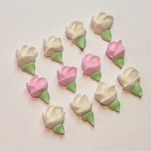 100 royal icing sugar buds ( 50 pink, 50 ivory) Approx. size 1/2”