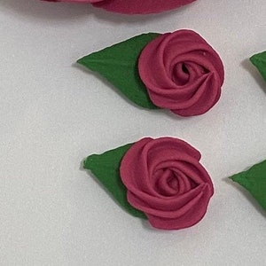 100 mini burgandy rosettes royal icing flowers Approx.size 1/2”
