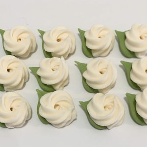 100 mini ivory  rosettes royal icing flowers Approx.size 1/2”