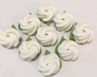 100 white royal icing rosettes with moss green leaf Approx. size 1/2