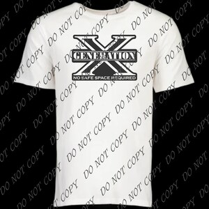 May include: White t-shirt with a black and white graphic of a large letter X with the word "GENERATION" printed above it and the text "NO SAFE SPACE REQUIRED" printed below it.