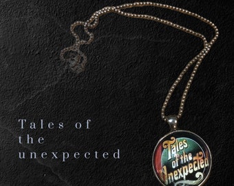 Tales of the Unexpected under glass silver pendant