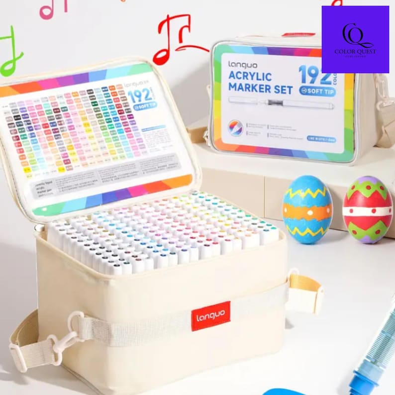 May include: A beige fabric case containing a 192-piece acrylic marker set, with a rainbow color chart on the inside lid. The set includes a variety of colors, and the case has a shoulder strap. Two decorative Easter eggs are also visible.