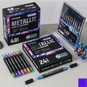 May include: A collection of metallic acrylic markers in various colors, with packaging that includes boxes of 48, 24, and 12 markers. The markers are labeled "Languo" and "Metallic Acrylic Marker" with a soft/hard double tip.