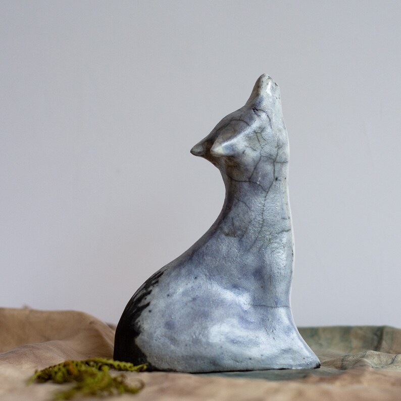 ceramic wolf statue