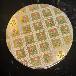 Gold and White Floral Tin