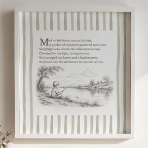 May include: A framed monochrome print depicting a child fishing by a lake, accompanied by a poem. The poem begins with the words, "Mud on his boots, sun in his hair." The frame is white with a striped green and white border.