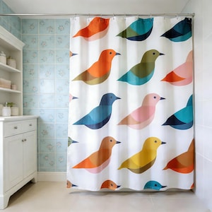 May include: White shower curtain with a repeating pattern of colourful, stylized birds. The birds are in shades of orange, blue, pink, and green, with a simple, geometric design. A modern and cheerful bathroom accessory.