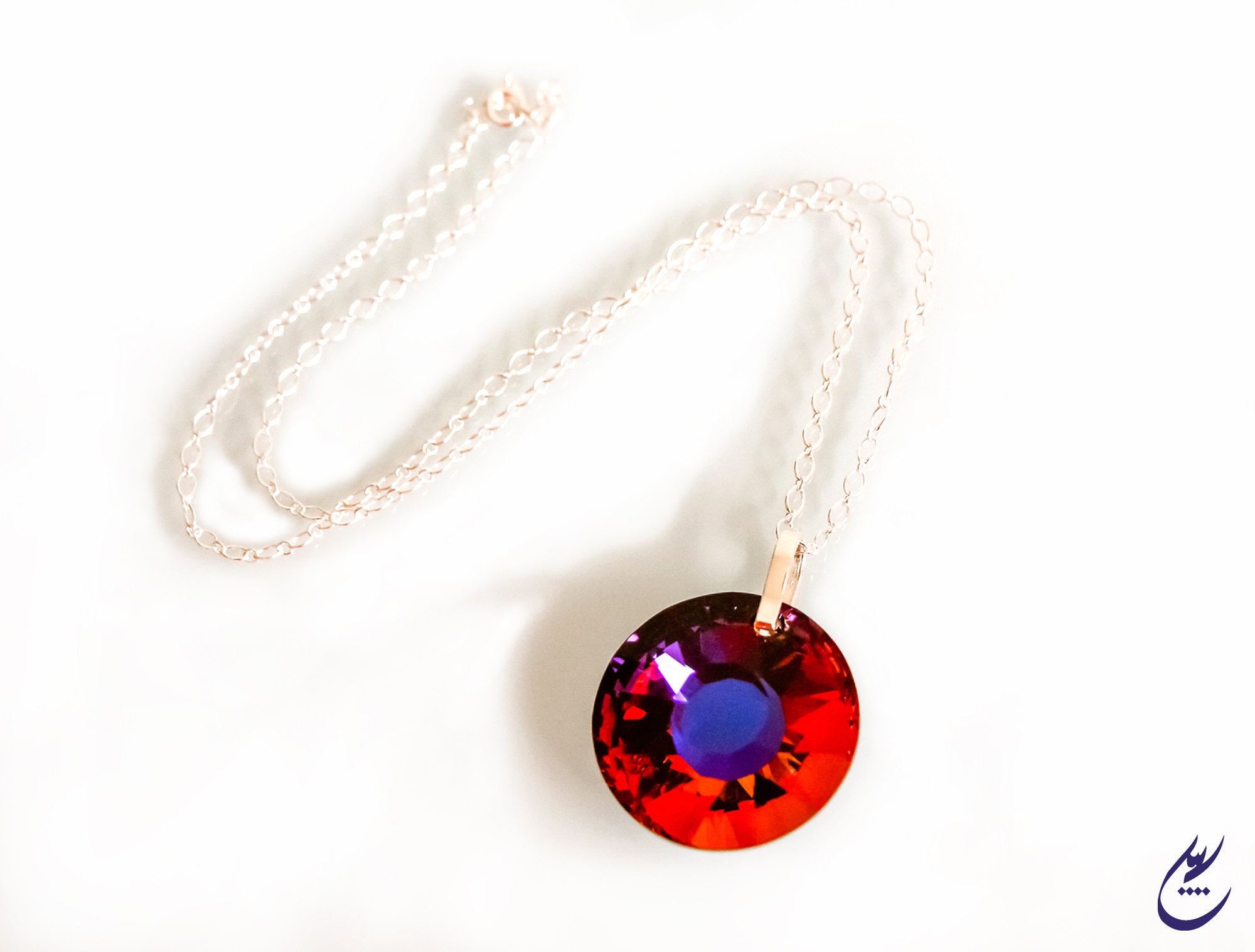 Swarovski sun pendant deals
