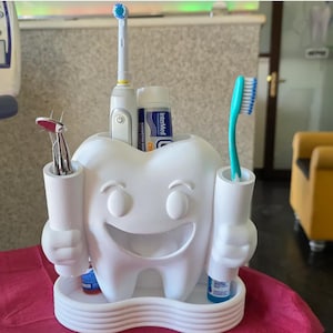 Toothy der Zahnbürsten und Zahnpasta Halter