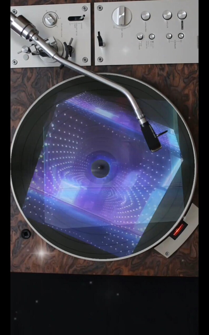 May include: A vintage turntable with a record playing. The record is a blue and purple holographic design with a swirling pattern. The turntable is made of wood and has a silver tone.