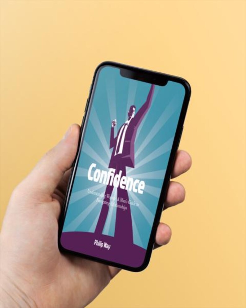 以下が含まれることがあります： スマートフォンには、「Confidence」というタイトルの本の表紙が表示されています。表紙には、腕を上げたスーツ姿の人物が、放射線状のラインが入ったターコイズブルーの背景に描かれています。著者の名前、Philip Wayは下部に表示されています。