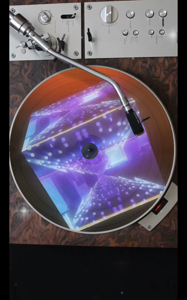 May include: A vintage record player with a turntable playing a record with a holographic image of a cube with a purple and blue design.
