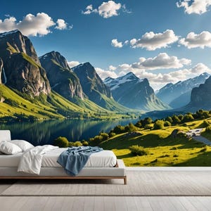 May include: A scenic landscape photograph featuring a lake surrounded by lush green hills and towering mountains. The sky is a bright blue with fluffy white clouds. The sun is shining brightly, casting a warm glow over the scene.