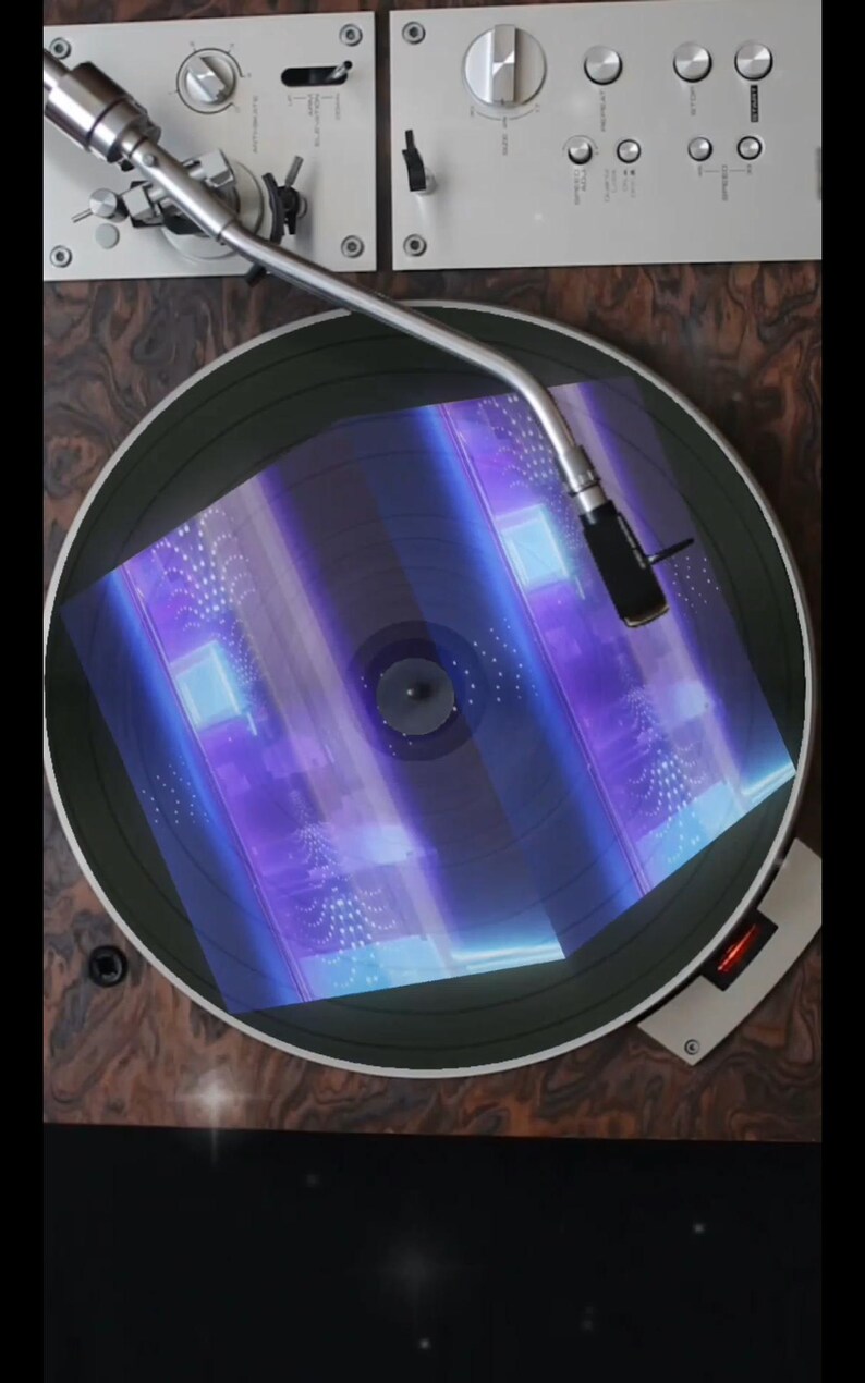 May include: A vintage record player with a black turntable and a silver tone arm. A record is playing on the turntable, and the record is illuminated with a blue and purple light.