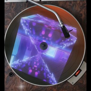 May include: A vintage turntable with a record playing. The record is a holographic cube with purple and blue colors.