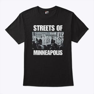 May include: Black t-shirt with the text "STREETS OF MINNEAPOLIS" in white block letters. A grayscale image of a protest is centered within the text. The image shows people holding signs.